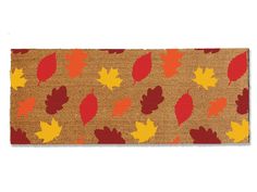 a door mat with autumn leaves on it