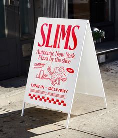 a sign on the sidewalk advertising slims pizza