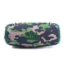 a bluetooth speaker with green and white camo print on it, sitting on a white background