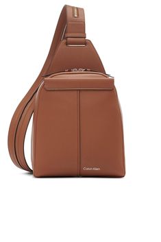 PRICES MAY VARY. High Quality Vegan Leather 1 EXTERIOR SLIP POCKET, 1 INTERIOR ZIP HANGING POCKET CONVERTIBLE: SLING CONVERTS INTO BACKPACK Dress Swimsuit, Backpack For Women, Leather Sling Bag, Suit Dress, Convertible Backpack, Comfort Wear, Calvin Klein Woman, Puffer Vest, Sling Bag