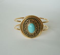 "Turquoise Bracelet This beautiful gold plated cuff bracelet has a turquoise gemstone  setting. 1.5\" wide at the widest part.  Adjustable. southwestern country western southwest cowgirl boho bohemian style" Jewelry Country, Gemstone Setting, Cowgirl Wedding, New Plymouth, Boho Cowgirl, Bohemian Bracelet, Boho Fashion Bohemian, Hippie Bracelets, Southwest Jewelry