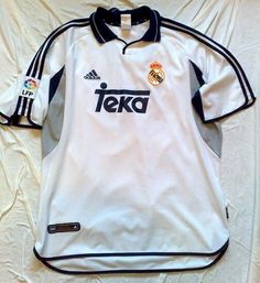 the jersey worn by real madrid's soccer team is displayed on a white sheet