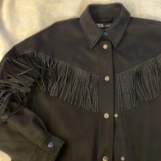 Nwt Zara Suede *Like Button Down Long Sleeve Shirt With Fringe Detail Size S Oversized Fit (Long From Shoulder To Hem) Two Front Pockets Button Closure And On Sleeve Fringe Have Black Rhinestones Zara Black Shirt For Fall, Zara Buttoned Blouse For Fall, Snap Button Tops For Night Out In Fall, Fall Shirt With Buttons For Night Out, Fall Tops With Button Cuffs For Night Out, Fall Night Out Tops With Button Cuffs, Fall Party Shirt With Button Cuffs, Zara Black Fall Shirt, Fringe Button Up Shirt