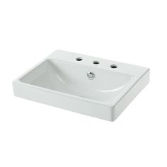 a white bathroom sink sitting on top of a counter