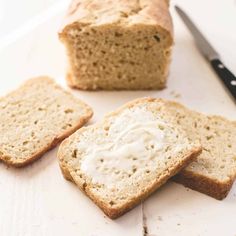 slices of bread sitting on top of a white table