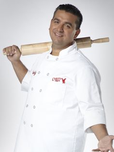 a man in a chef's uniform holding a baseball bat over his shoulder and smiling at the camera