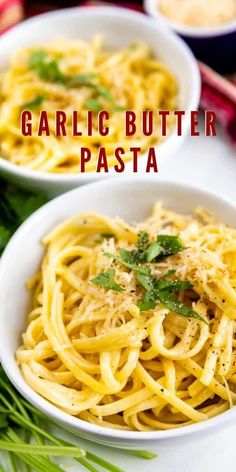 two white bowls filled with garlic butter pasta