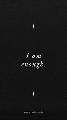 the words i am enough are written in black and white on a dark background with stars