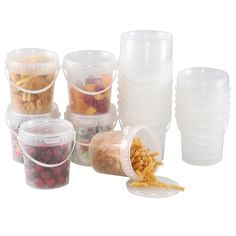 several plastic containers filled with different types of food