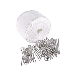 a roll of white cloth with pins and needles next to it on a white background