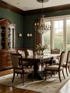 a dining room table with chairs and a chandelier