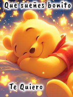 a winnie the pooh laying on top of a bed with stars in the background