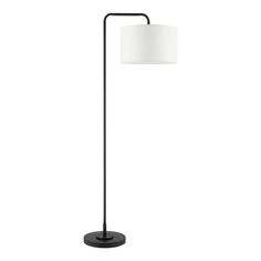 a black floor lamp with a white shade