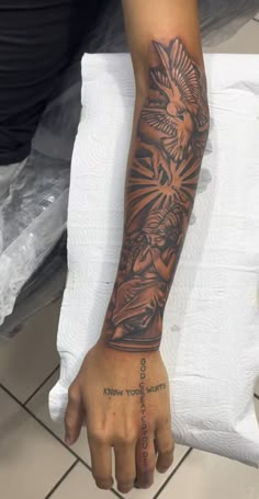 a person with a tattoo on their arm