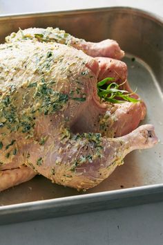 a close up of a chicken in a pan