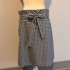 This Is The Cutest Black And White Checkered Brand New, With Tags Skirt By Cynthia Rowley. It Has Ruffles At The Waist And An Attached Tie On The Waist. It’s Great Quality And Has A Button And Zipper On The Side And 2 Back Pockets. Approximately 16” At The Waist And 22.5” Long. It’s Perfect For The Office Or For Teaching! No Swaps! Chic Plaid Skort For Spring, Checkered Skirt, Cynthia Rowley, On The Side, A Button, The Office, Ruffles, A Line, Womens Skirt