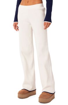 A low rise adds to the retro flair of these chic and comfortable ribbed pants. 50% polyester, 50% rayon Machine wash, dry flat Imported White Winter Pants, Christmas Wishlist 2023, Cute Simple Winter Outfits, Knit Pants Outfit, Ribbed Pants, Mid Rise Pants, Trendy Pants, Low Rise Pants, Fall Pants