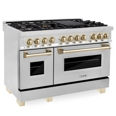 a white stove with two ovens and gold knobs on the front, against a white background