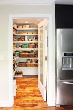 an open pantry with lots of food in it