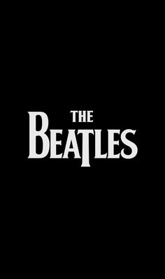 the beatles logo on a black background