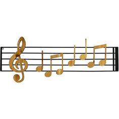 an image of musical notes on a wall hanging ornament in wood and metal