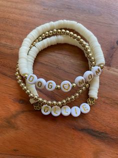 Clay and gold beads with white and gold letters to make this a fun little set any dog mom would be sure to love. Dog Mom Bracelet, Mom Clay Bead Bracelet, Clay Bead Bracelets, Beaded Braclets, Mom Bracelet, Clay Bead Bracelet, Bead Projects, Moms Bracelet, Clay Bracelet