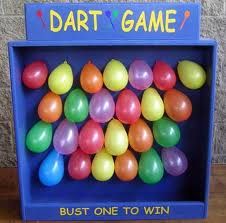 a blue box with balloons in it and the words dart game written on it, but one to win