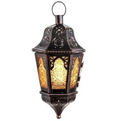 an ornately decorated hanging lantern on a white background