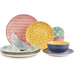 four plates and two bowls with designs on them