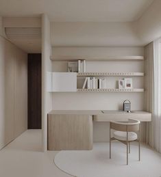 a white room with a desk and shelves