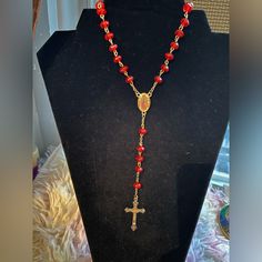 Beautiful Rosary With Red Beads. The Cross Is In Gold Super Cute. Red Beaded Chain Necklace For Valentine's Day, Red Faceted Beads Jewelry For Valentine's Day, Red Round Beaded Necklaces For Valentine's Day, Red Round Beads Necklace For Valentine's Day, Red Necklaces With 8mm Beads For Jewelry Making, Valentine's Day Red Beaded Necklaces, Adjustable Red Rosary With 8mm Beads, Red 8mm Beaded Jewelry For Valentine's Day, Red Beaded Jewelry For Valentine's Day