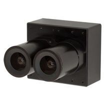 two cameras mounted to the side of a black metal wall mount box on a white background