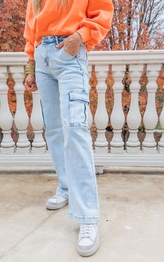 Rock a retro fit with The Brooklyn High Rise Cargo Denim Jean | Risen. Look urban cool in these high-rise wide-leg cargo pants – the perfect combo of '70s-style chill and modern downtown vibes. It's fashion-forward with a vintage twist! MEASUREMENTS: Rise 10 1/2" | Inseam 30" in size 3/26 FABRIC: 74% COTTON, 24% POLYESTER, 2% SPANDEX SARA FITS Stick with your true denim size.  Sara is 5’7” and a size 3(26) in RISEN.  She is wearing her TTS 3/26.  If your new to odd sizes, take your even and subtract it by one.  If you straddle 2 even sizes, take the middle size (ex: btw 4/6 - get the size 5) Be sure to watch the full FIT VID in the App (SHOP BAD HABIT) to see how it fits and feels.  To be the First to see our newest arrivals, don't forget to join our amazing and fun Facebook Community!!  D Downtown Vibes, Retro Fits, Bad Habit, 70s Style, Rock A, High Rise Denim, Denim Flares, Wide Leg Denim, Colored Denim