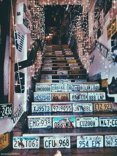 the stairs are decorated with license plates and lights