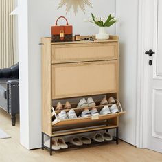 a shoe rack with shoes on it in front of a door