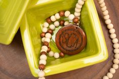 Handmade Wood Bead Necklace with Monogrammed Pendant These necklaces are made with a stretchy elastic band and strung with 10mm wooden beads and is approximately 29.5 inches long.  The engraved pendant is approximately 2 inches.  These necklaces make fantastic gifts for moms, sisters, friends, co-workers and so many more!  Don't forget to treat yourself to one too!  Also check out the matching bracelets we have in our shop.   Font and Color Options: -We offer 3 different font options (see details in pictures) -We offer 4 different bead color variations (see details in pictures) If you have any questions about these necklaces, please message us prior to ordering.  We respond to all messages in less than 24 hours.   Our shop is known for extremely fast shipping.  In most cases your order wil Gifts For Moms, Necklace Wood, Engraved Pendant, Wood Bead Necklace, Monogram Necklace, Matching Bracelets, Handmade Wood, Fantastic Gifts, Treat Yourself