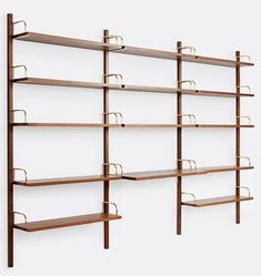 three wooden shelves with metal handles on each shelf and one is open to show books