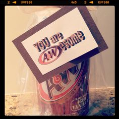 there is a sign that says you are awesome on top of a beer can in a plastic bag