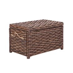 a brown wicker box sitting on top of a white background