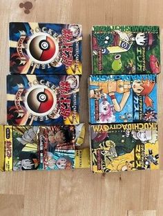 four different pokemon trading cards on top of each other