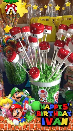 super mario birthday cake pops are on display