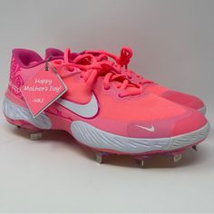 a pair of pink and white shoes with happy mother's day tag on them