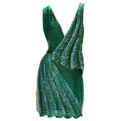 Roberto Cavalli Fully Beaded Drape Illusion Mini Dress Designer size - 40 100% Silk, Fully Hand Beaded in Green and Graphite Beads in Drape Illusion Look, Deep Plunging, Fully Lined. Measurements: Length - 33 inches, Bust - 30/32", Waist - 26", Hips - 36". Made in Italy. Excellent condition. Roberto Dress, Plunging Dress, Roberto Cavalli Dress, Haute Couture Gowns, Tree Dress, Rose Gold Sunglasses, Plunge Dress, Dress Designer, Green Sequins