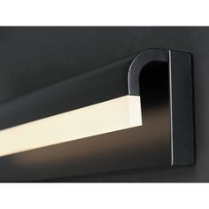 a black light fixture with a white strip on it's side and an open window in the middle