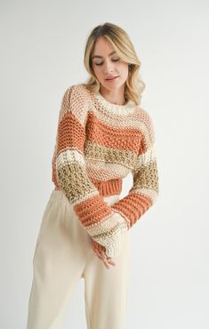 Overview:Stay stylish and cozy with the Butter Pecan Chunky Knit Sweater. Featuring a beautiful blend of warm earthy tones, this sweater is a perfect addition to your fall wardrobe. The thick, chunky knit design offers maximum warmth and comfort, while the cropped fit and long sleeves add a touch of modern style. Whether paired with high-waisted jeans or comfy joggers, this sweater is sure to keep you looking chic all season long. Key Features: • Chunky knit design for a cozy, textured look • Ea Formal Dress Shops, Chunky Knit Sweater, Butter Pecan, Chunky Knits Sweater, Chunky Sweater, New Tops, Jacket Sale, Knitting Designs, Chunky Knit