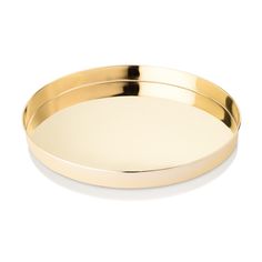 an oval brass tray on a white background