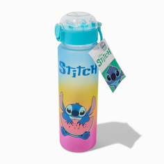 a blue and pink water bottle with stitch on it