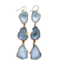 These stunning gray agate geode earrings are sure to add style and effortless sophistication to your wardrobe. The natural stones feature a unique design, sure to make a statement. Perfect for everyday wear or a special occasion, these earrings will be a beautiful addition to your collection. 4" Long 14k Gold-filled Earring Hooks Heaviness: 2.5/10 Geode Jewelry, Gray Earrings, Geode Earrings, Grey Agate, Light Earrings, Agate Earrings, Stone Feature, Agate Geode, Crystal Stars