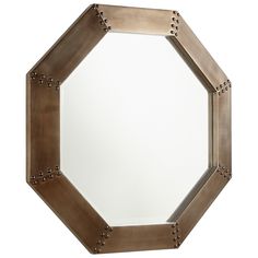 an octagonal mirror with rivets on the sides and a white backround