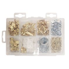 an assortment of screws and nuts in a plastic case